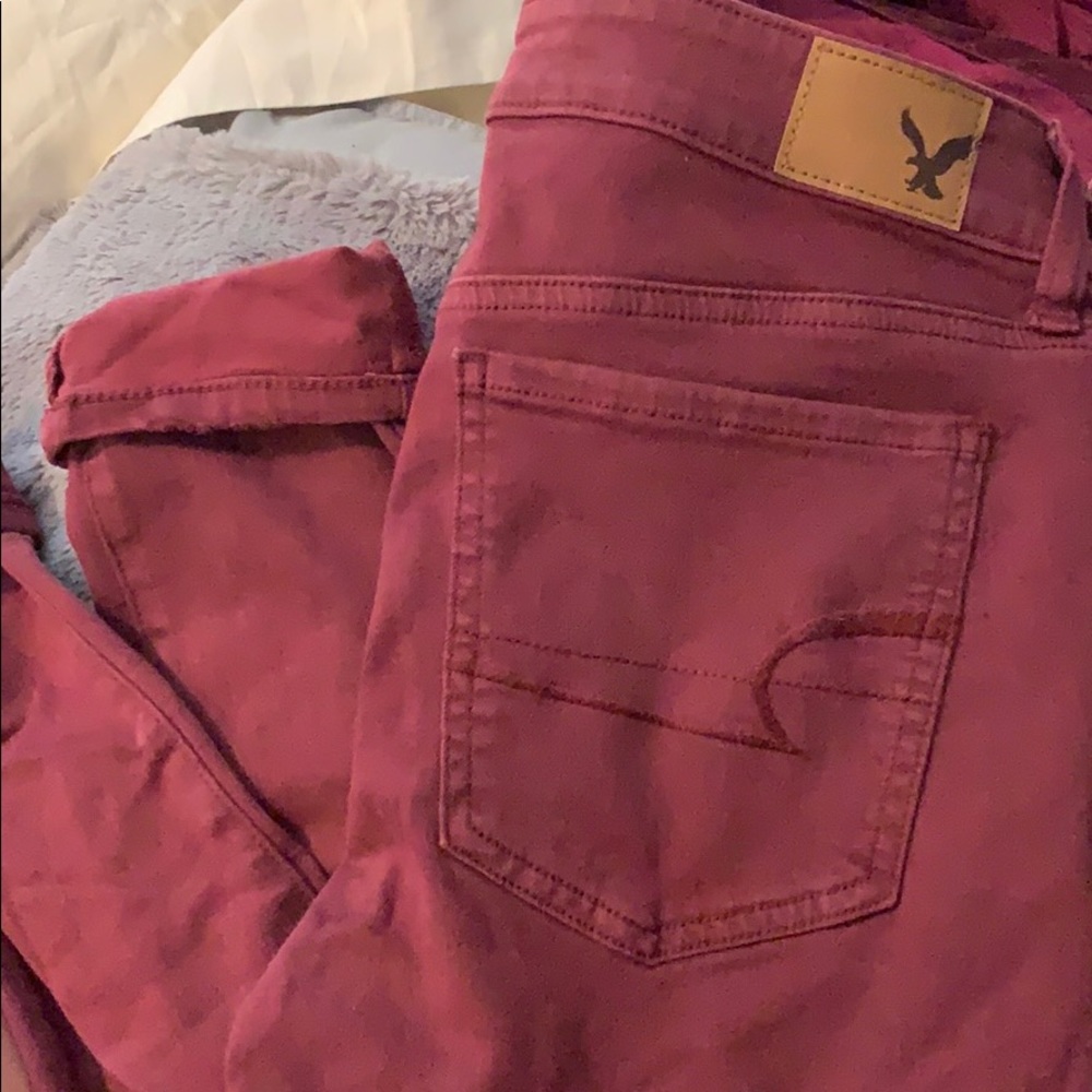Burgundy, ripped ae jeggings